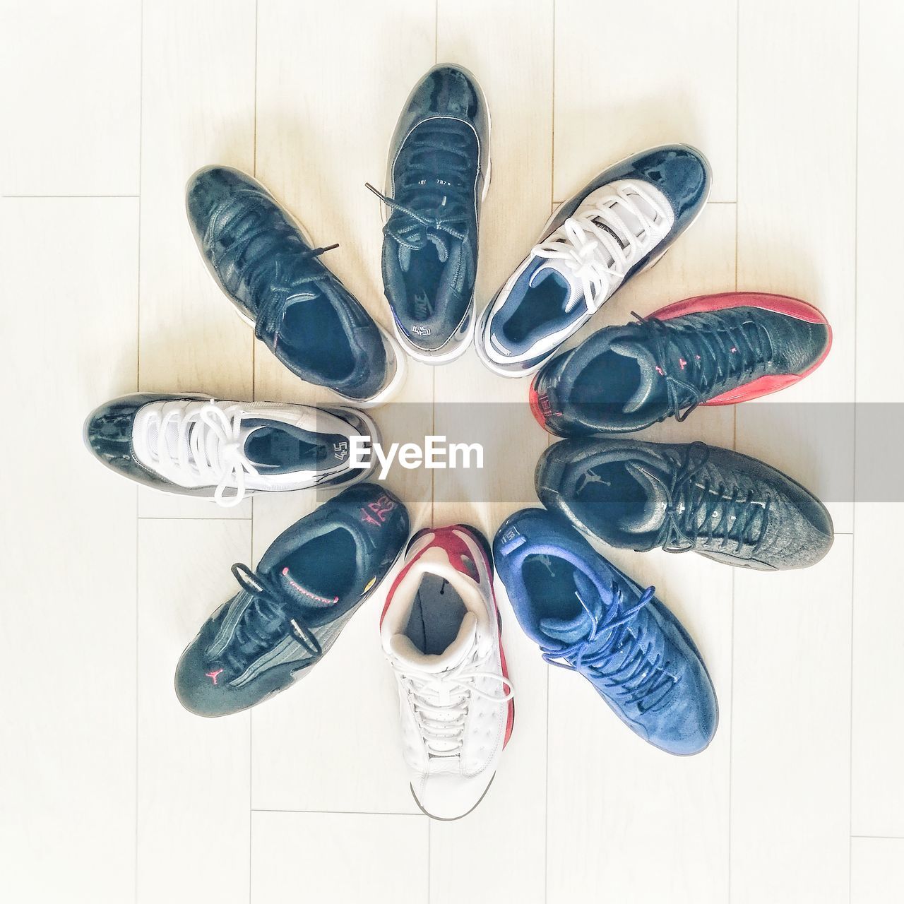 HIGH ANGLE VIEW OF SHOES ON TABLE