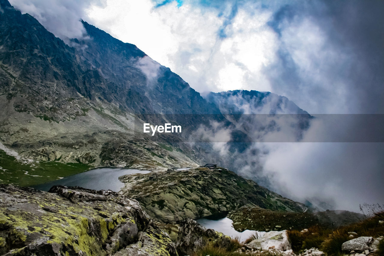 Scenic view of mountains in foggy weather