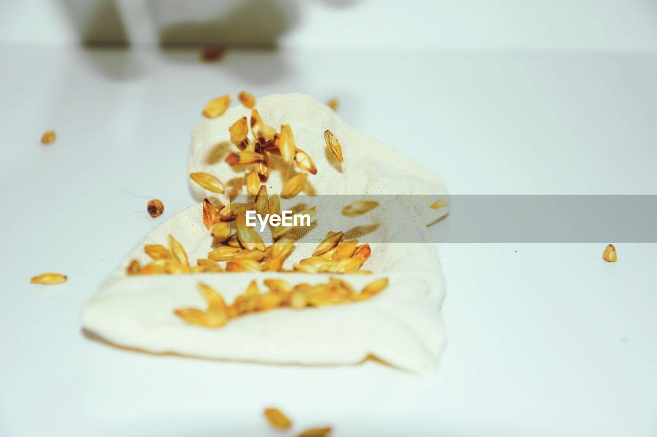 Close-up of ear of wheat on table