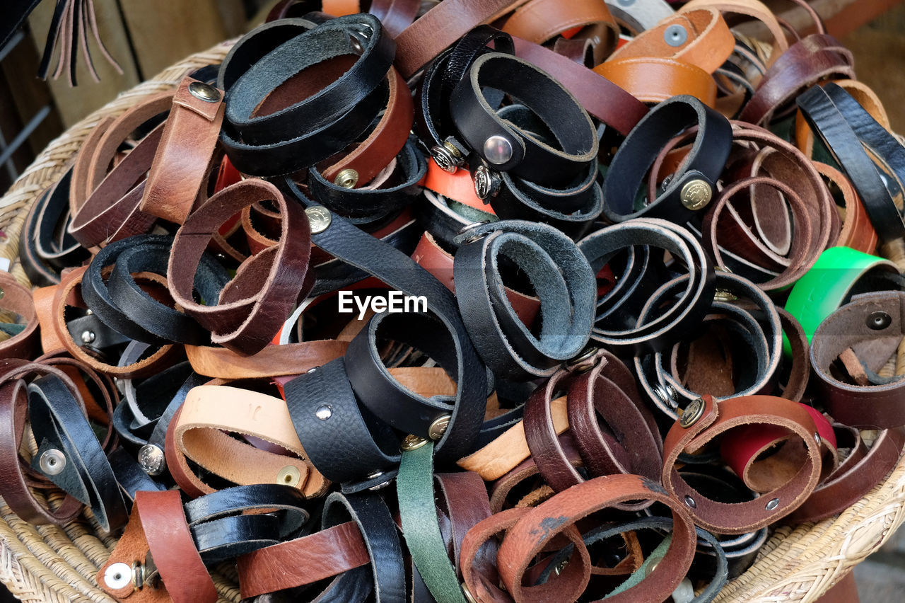 High angle view of wristbands in container