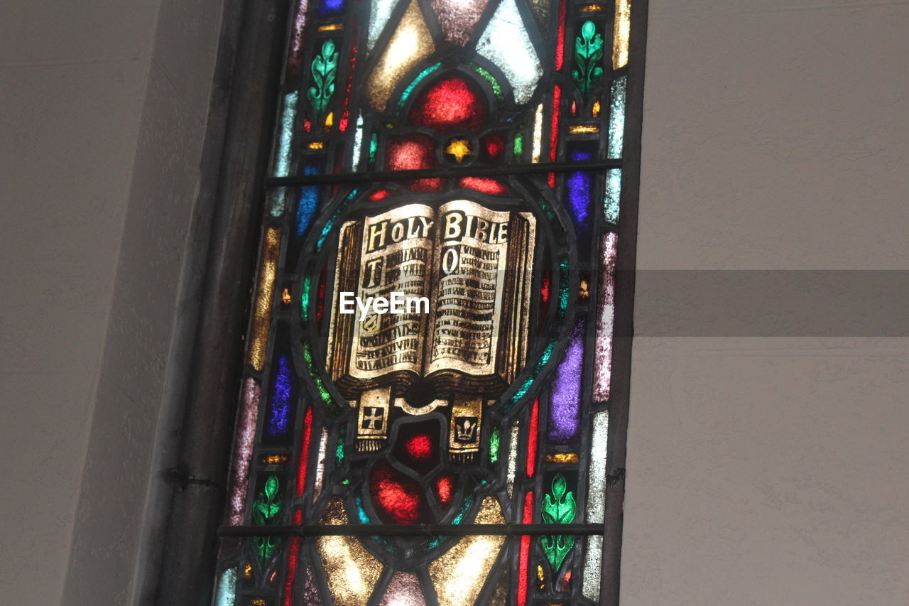 Low angle view of stained glass in church