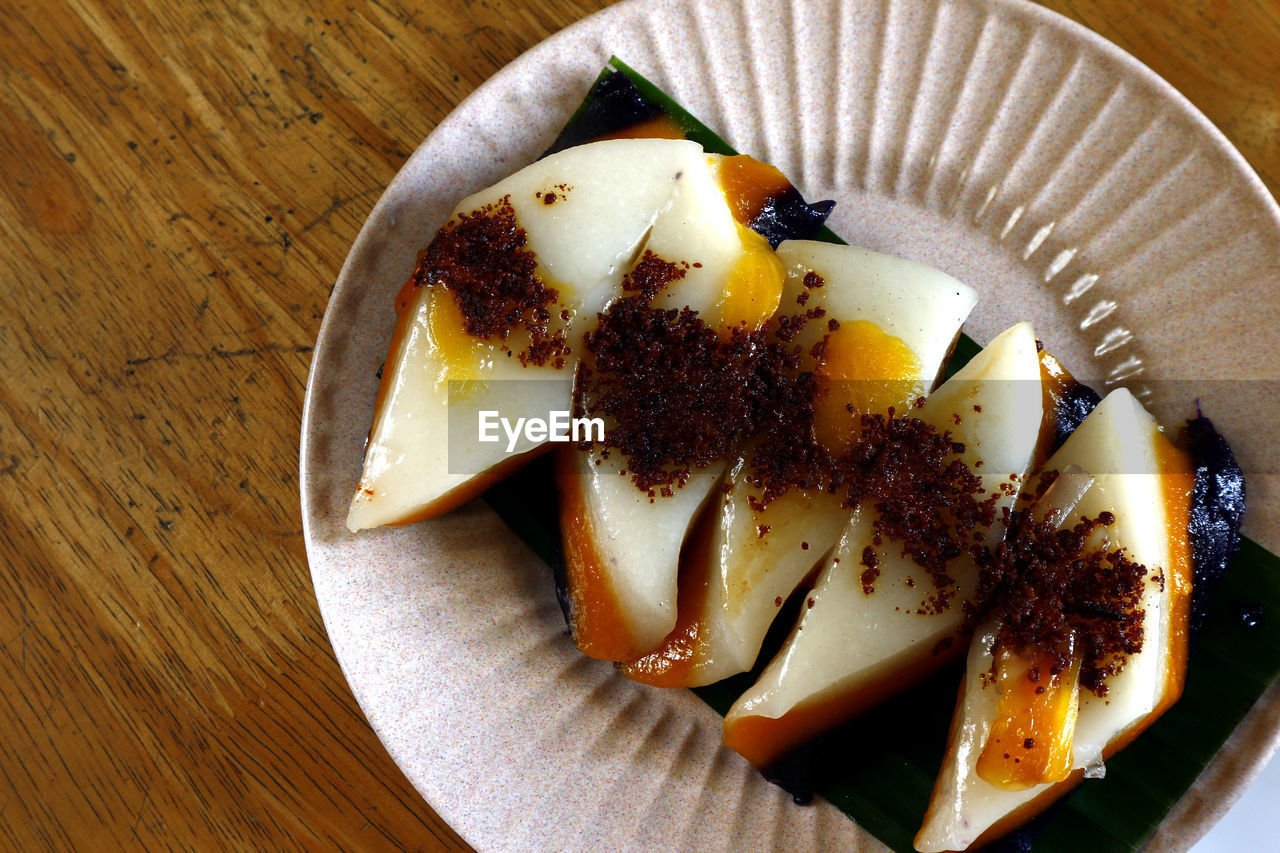 HIGH ANGLE VIEW OF DESSERT SERVED ON TABLE