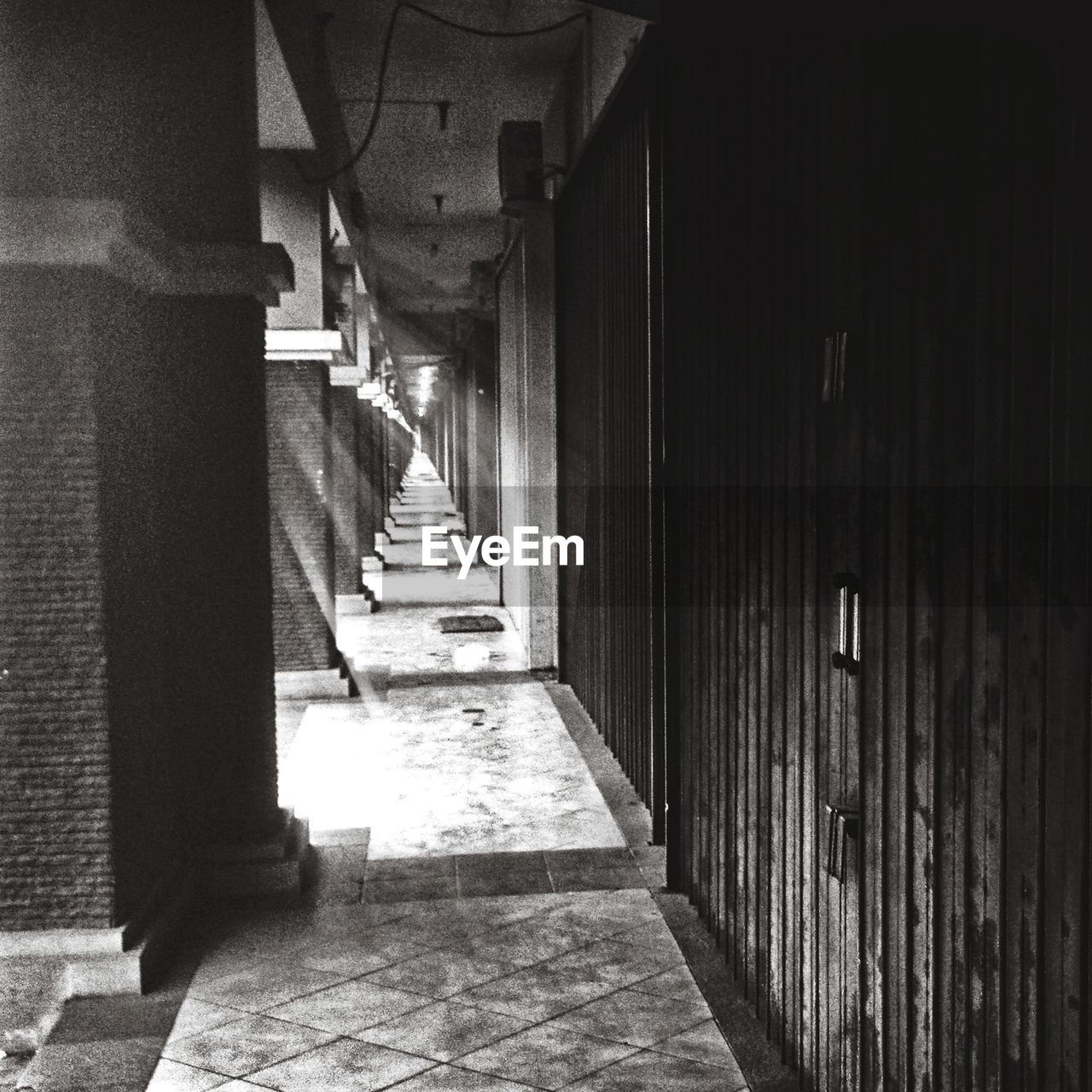 ALLEY AMIDST HOUSES