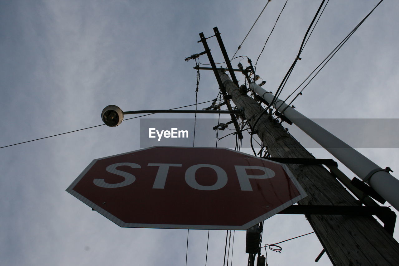 LOW ANGLE VIEW OF ROAD SIGN