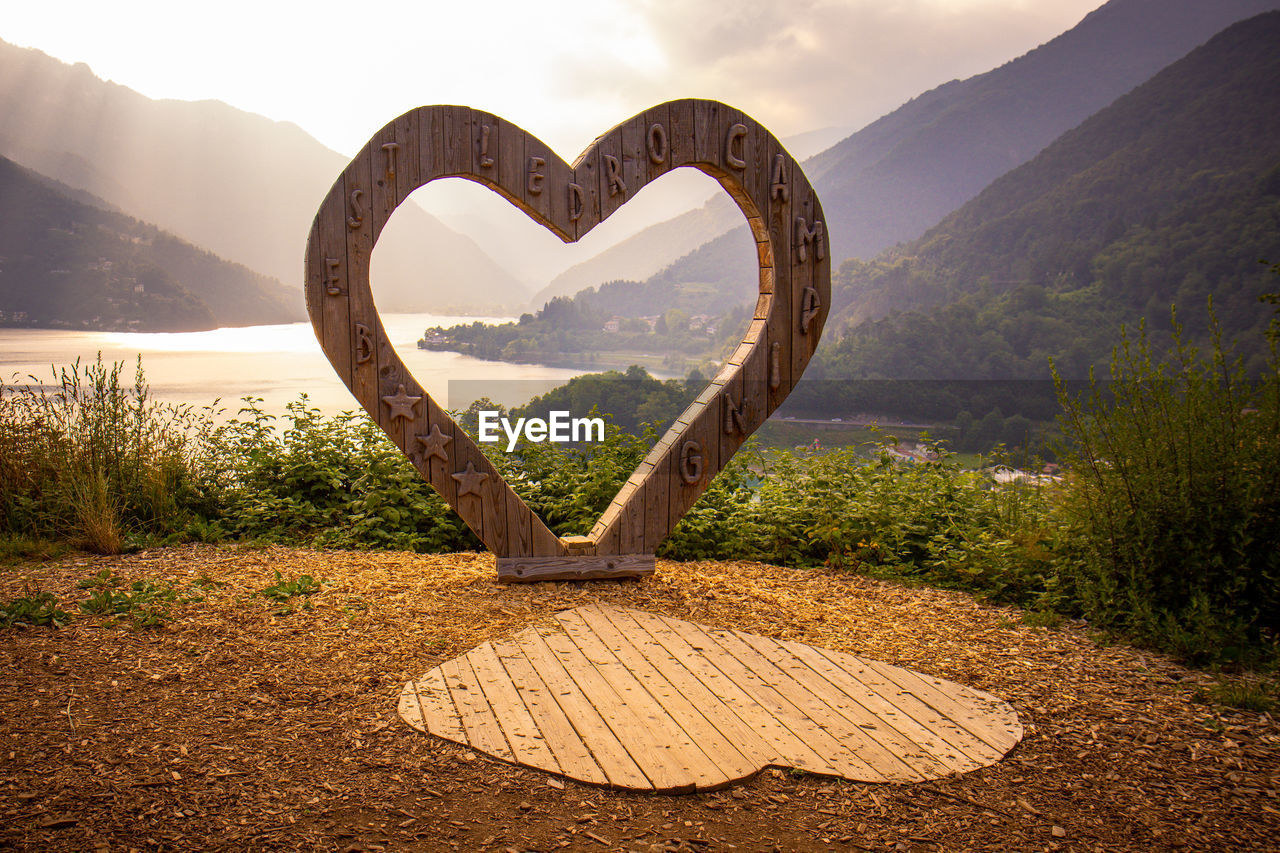 heart shape, love, nature, positive emotion, sky, emotion, plant, mountain, no people, morning, landscape, scenics - nature, environment, beauty in nature, outdoors, tranquility, land, tree, water, valentine's day, cloud, day, lake, tranquil scene, shape, creativity, sunlight, travel destinations