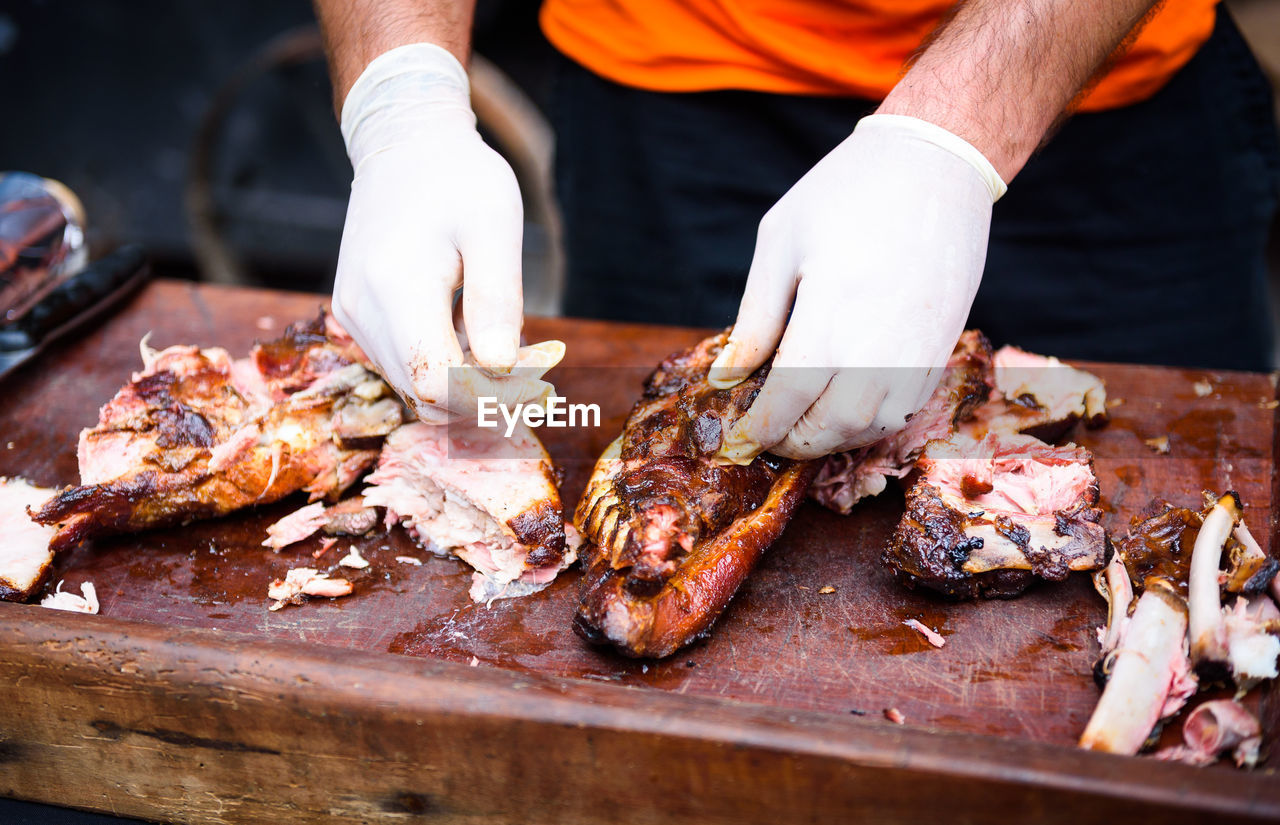 Cropped image of chef preparing food