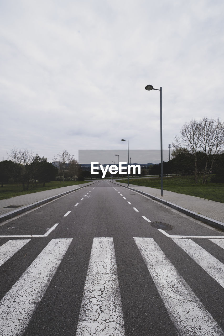 Empty street with traffic signs in an industrial area in a spanish city