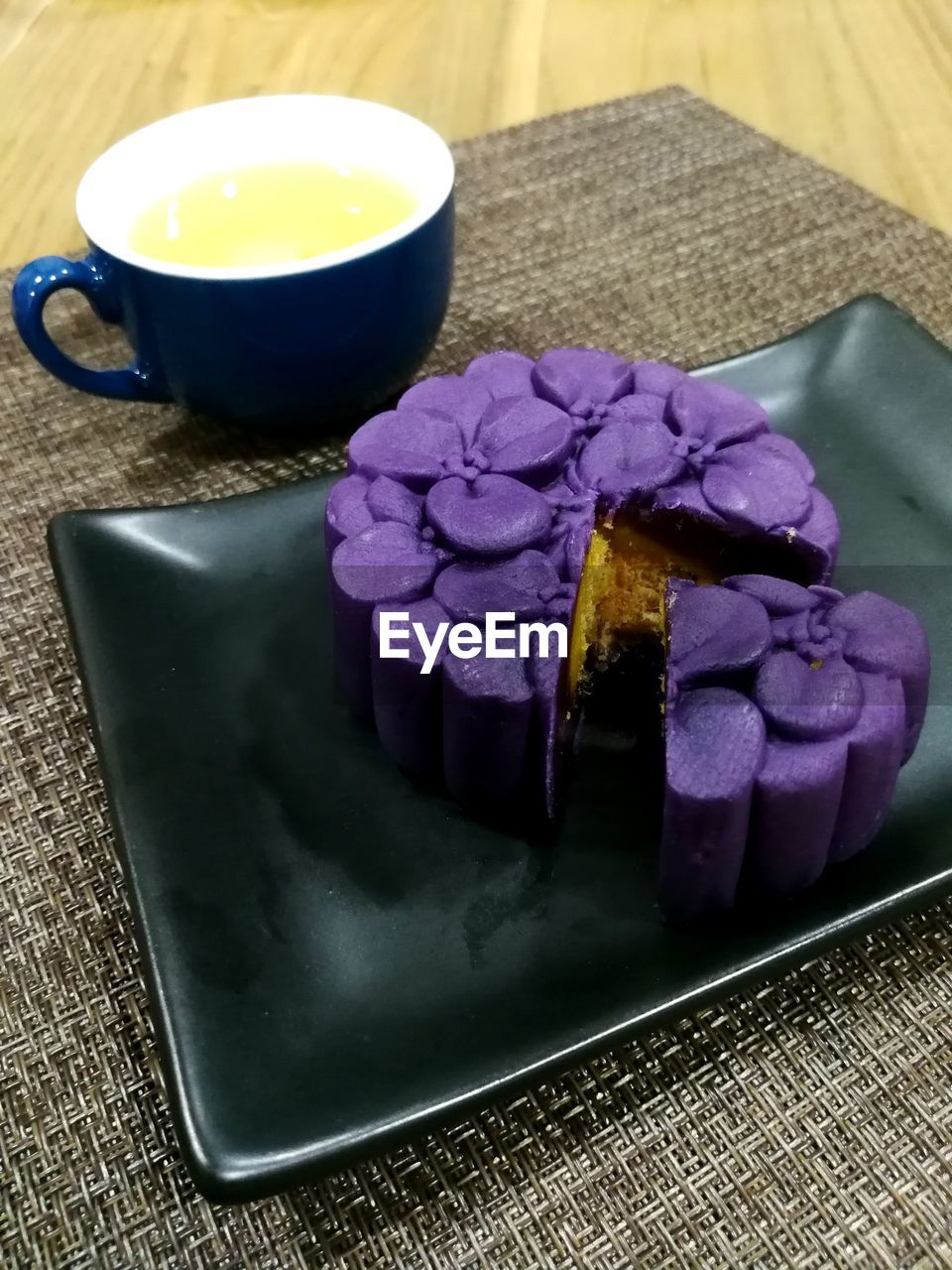 HIGH ANGLE VIEW OF ICE CREAM ON TABLE AT HOME