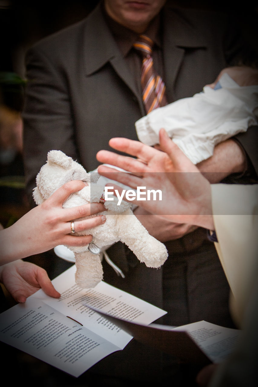 adult, men, two people, hand, wedding, ceremony, business, bride, women, wedding dress, holding, indoors, paper, togetherness, ring, female, person, document, celebration, emotion, jewelry