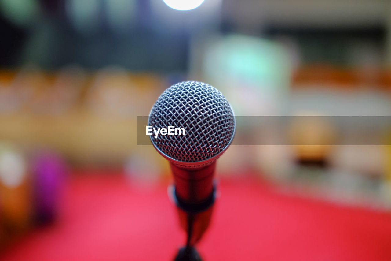 Close-up of microphone on stage