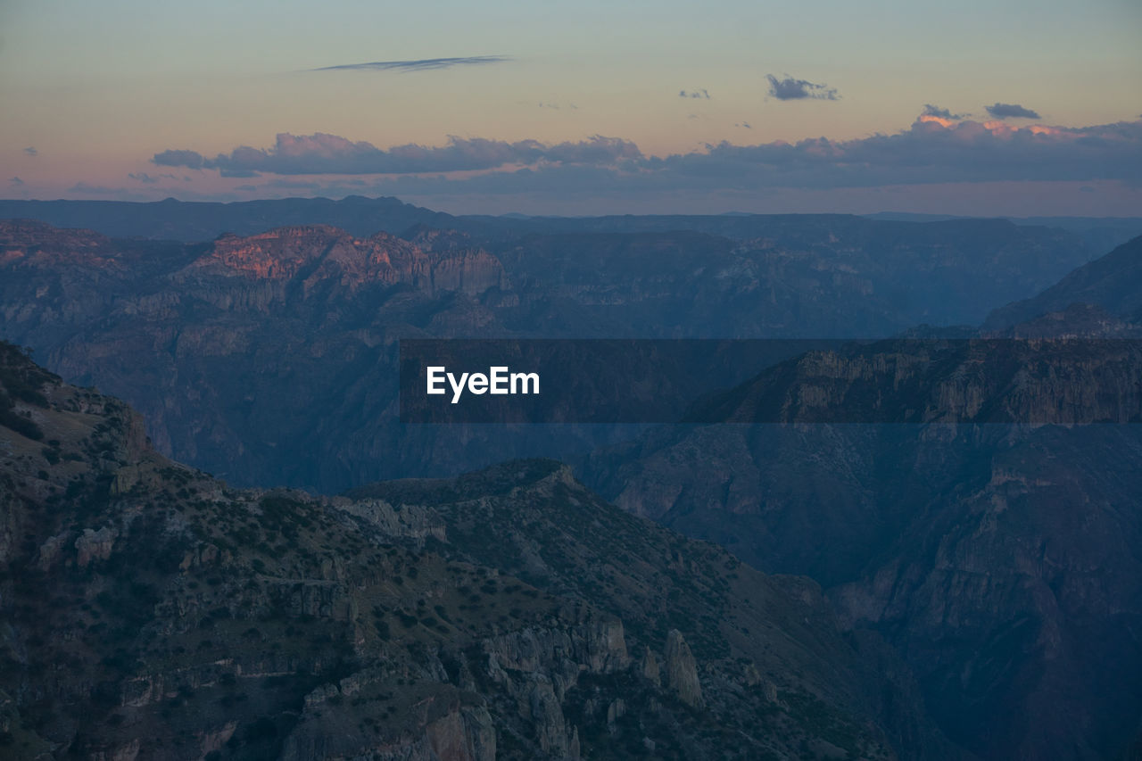 Aerial view of rock formations against sky during dusk in copper canyon / barrancas del cobre