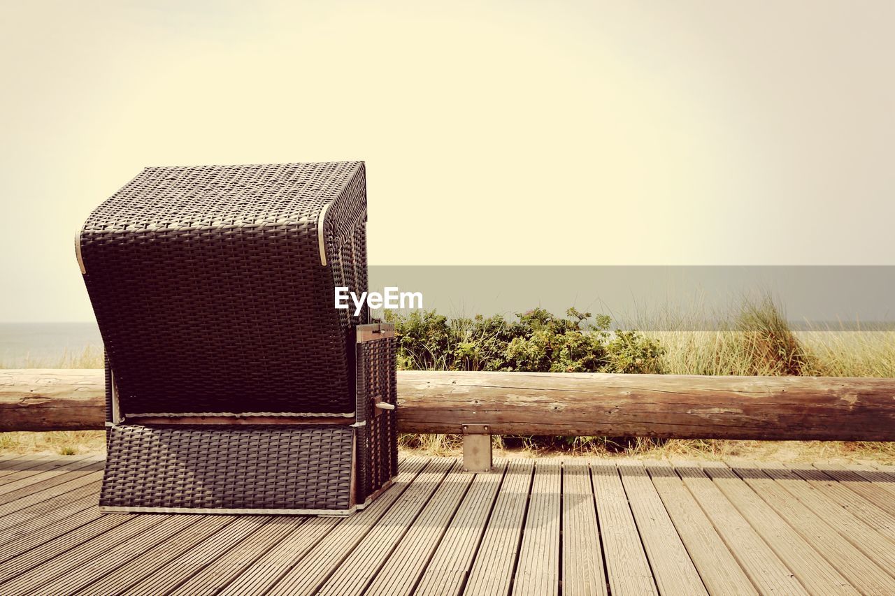 Hooded beach chair on pier