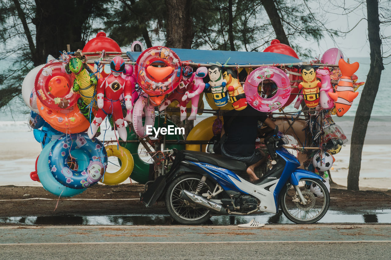 HIGH ANGLE VIEW OF TOYS ON STREET