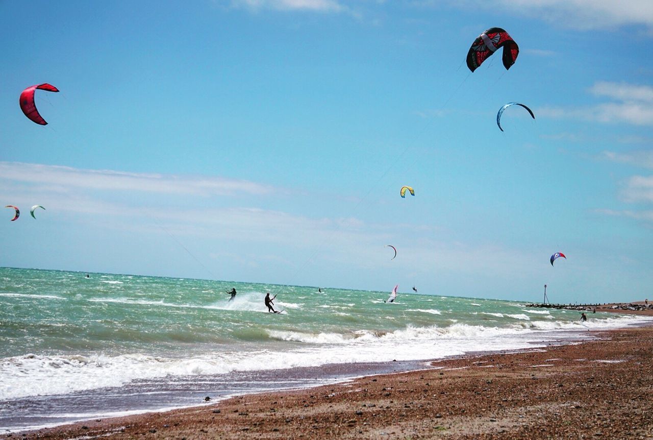 PEOPLE ENJOYING AT BEACH