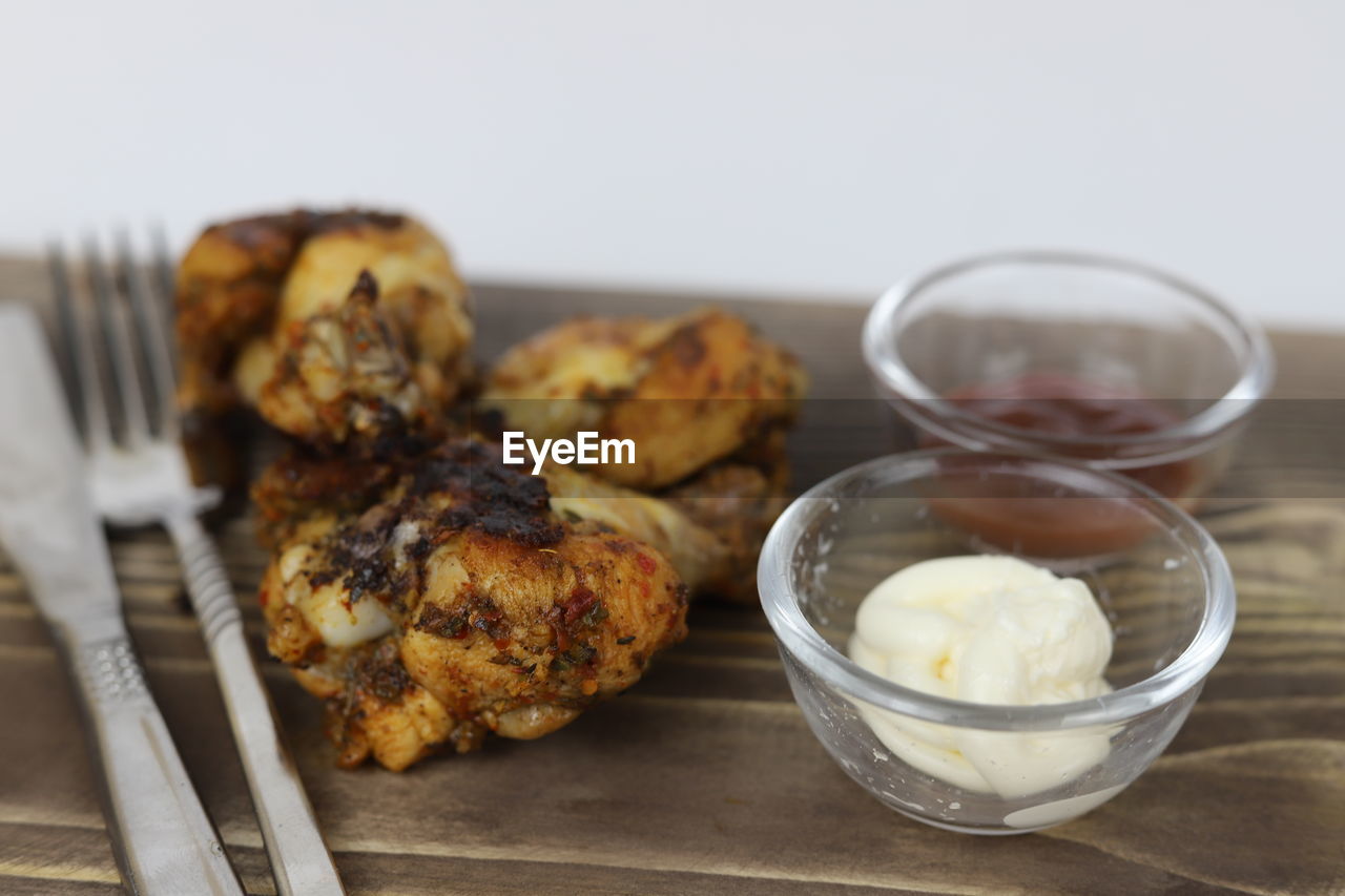 food and drink, food, dish, freshness, breakfast, produce, dessert, healthy eating, meal, indoors, no people, fried food, studio shot, wellbeing, baked, eating utensil, meat, kitchen utensil, close-up, household equipment, wood, cuisine, focus on foreground, vegetable, table