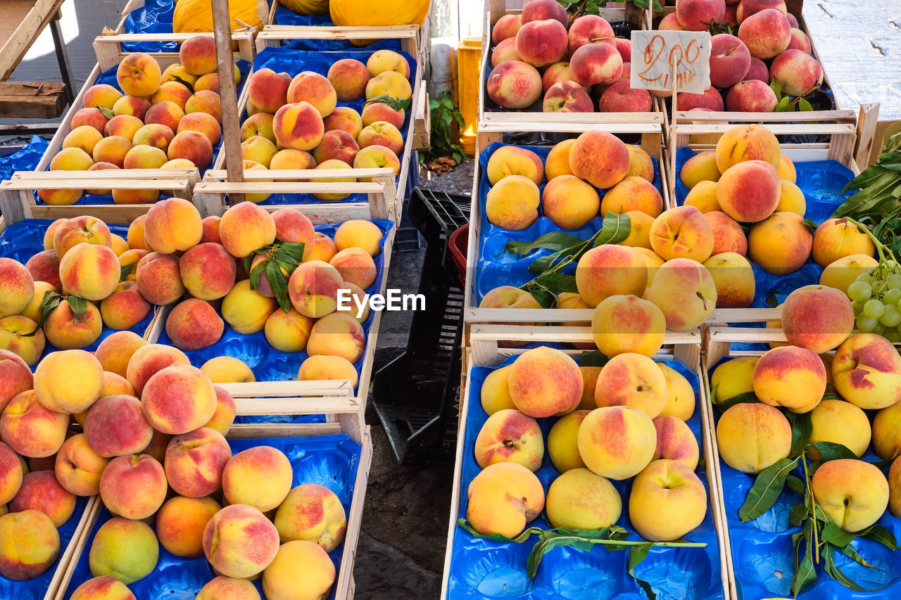 Peaches and nectarines for sale at a market