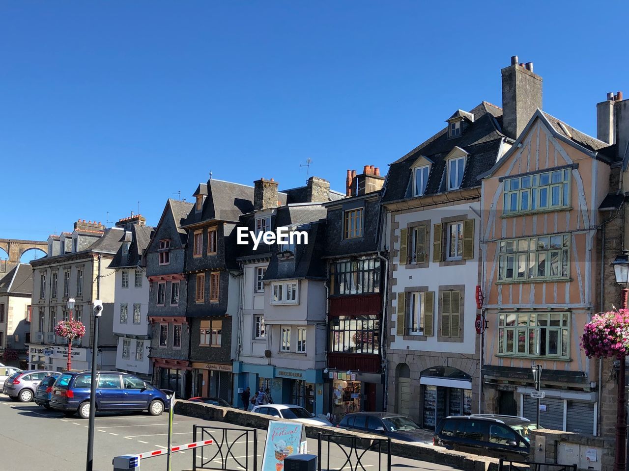 RESIDENTIAL BUILDINGS AGAINST CLEAR BLUE SKY