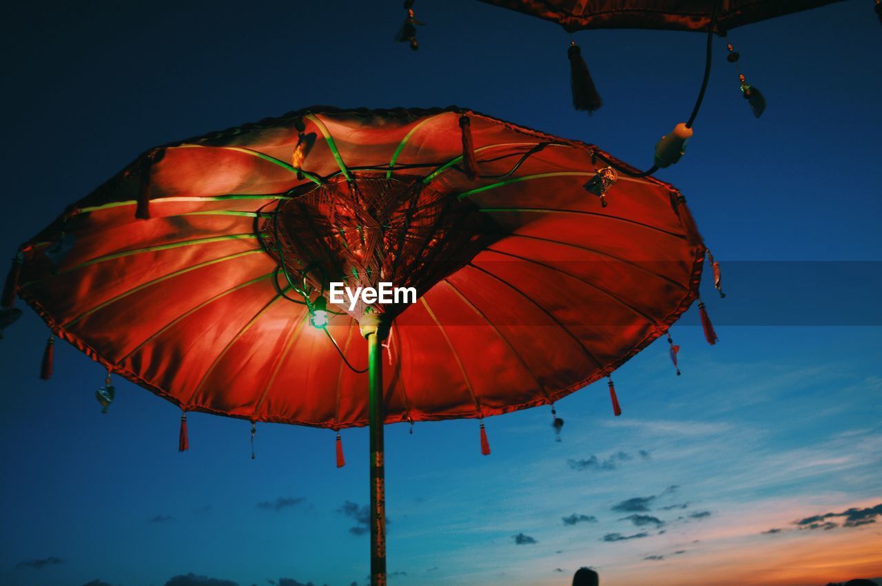 LOW ANGLE VIEW OF LANTERN AGAINST SKY