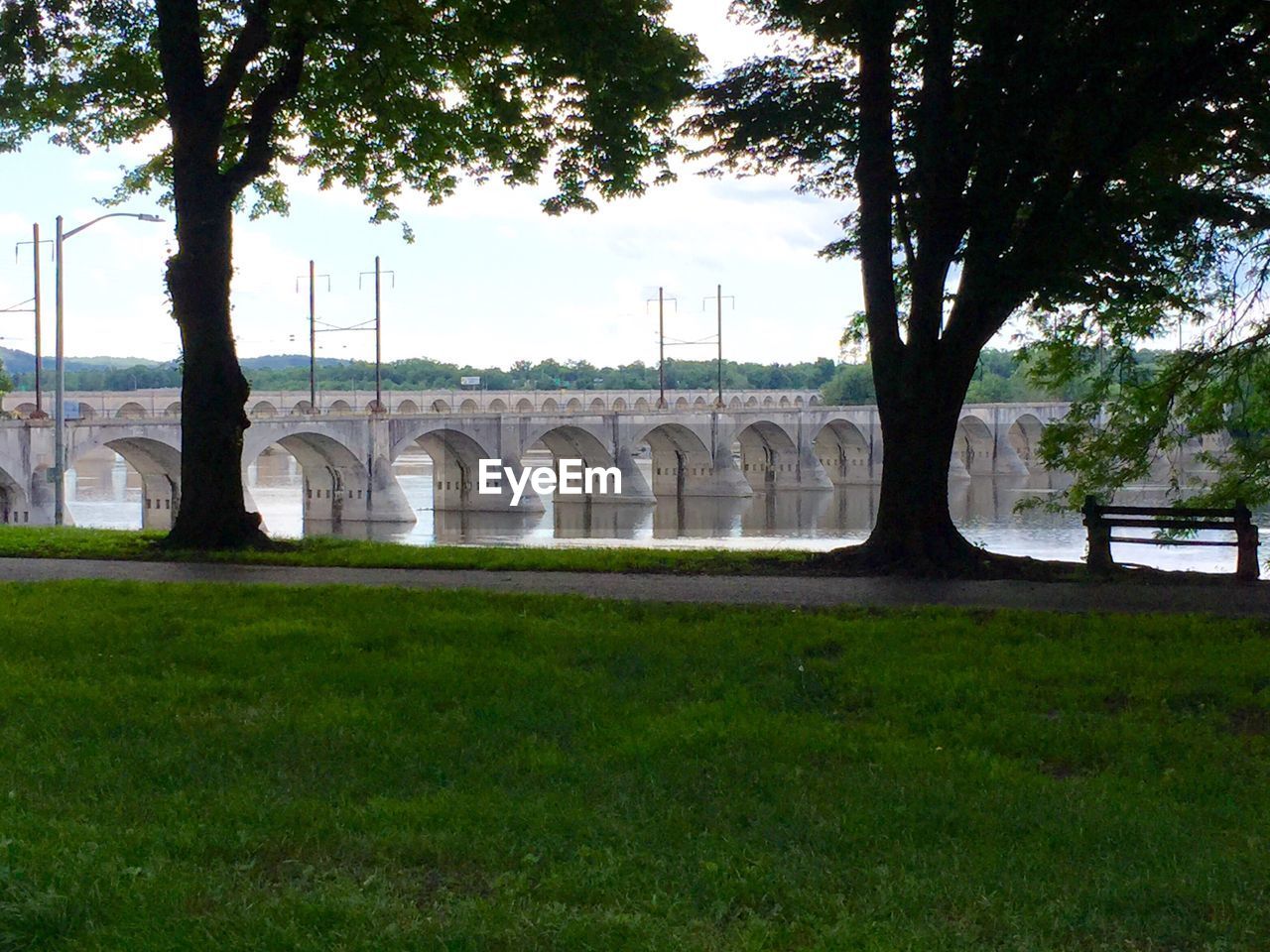 Arch bridge over susquehanna river seen from park