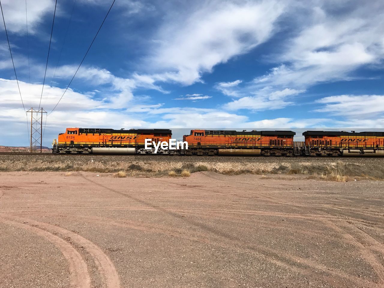 VIEW OF RAILWAY TRACKS AGAINST SKY