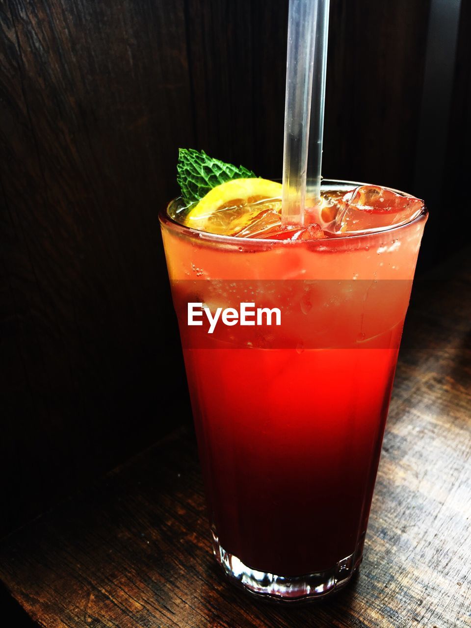 CLOSE-UP OF DRINK IN GLASS