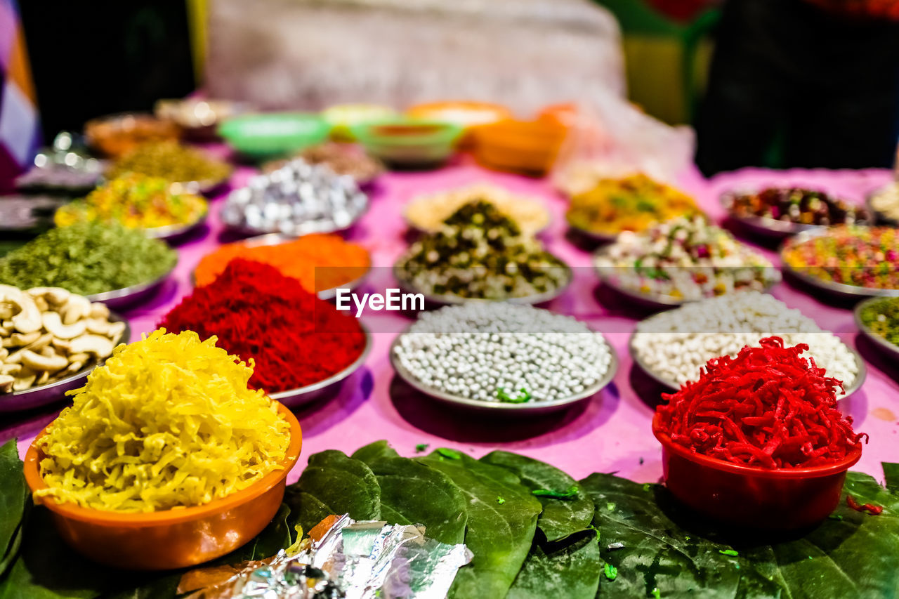 CLOSE-UP OF VARIOUS FOOD FOR SALE AT MARKET STALL