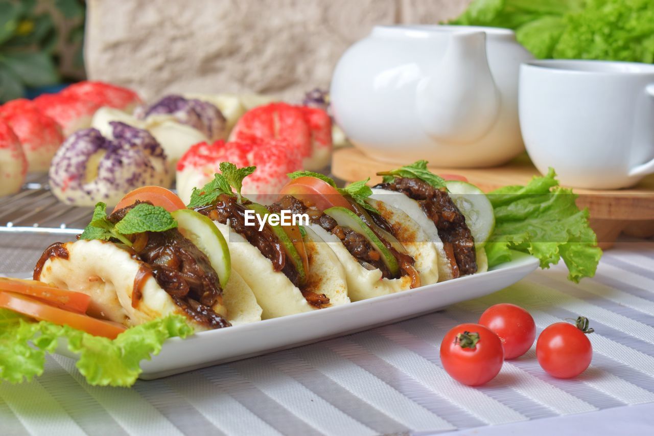 Close-up of breakfast served on table