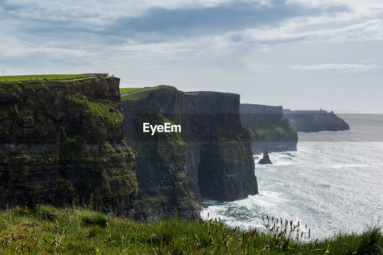 CLIFF BY SEA AGAINST SKY