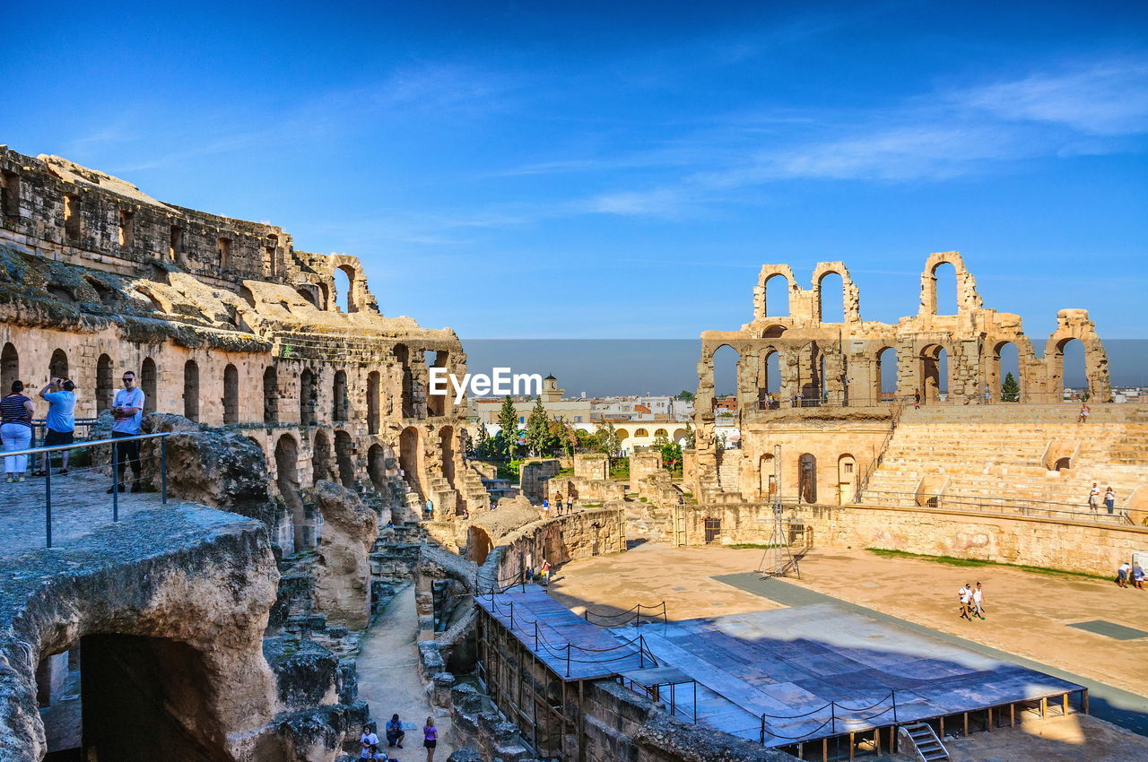 OLD RUINS AGAINST BLUE SKY IN CITY