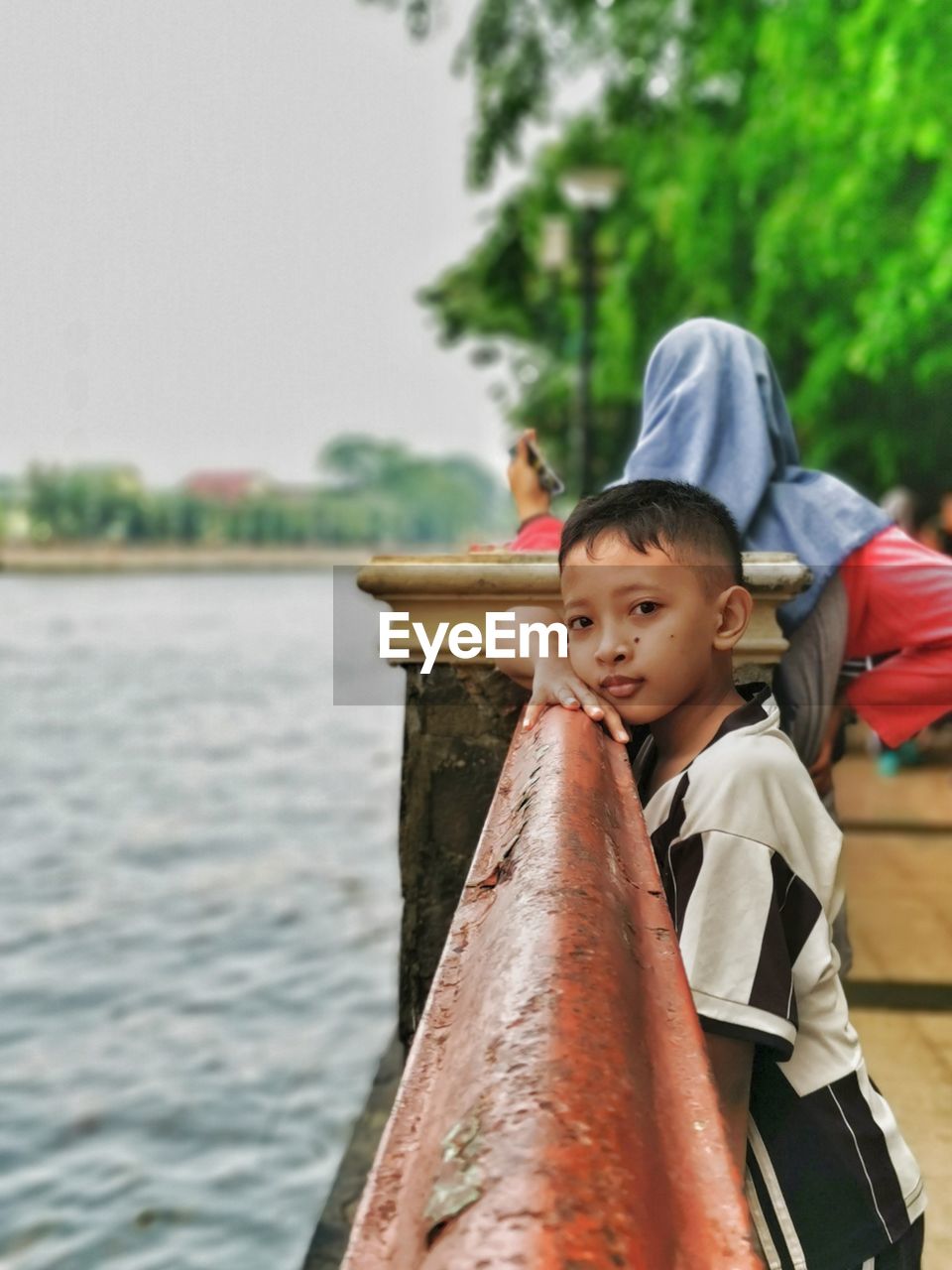 Portrait of boy on water