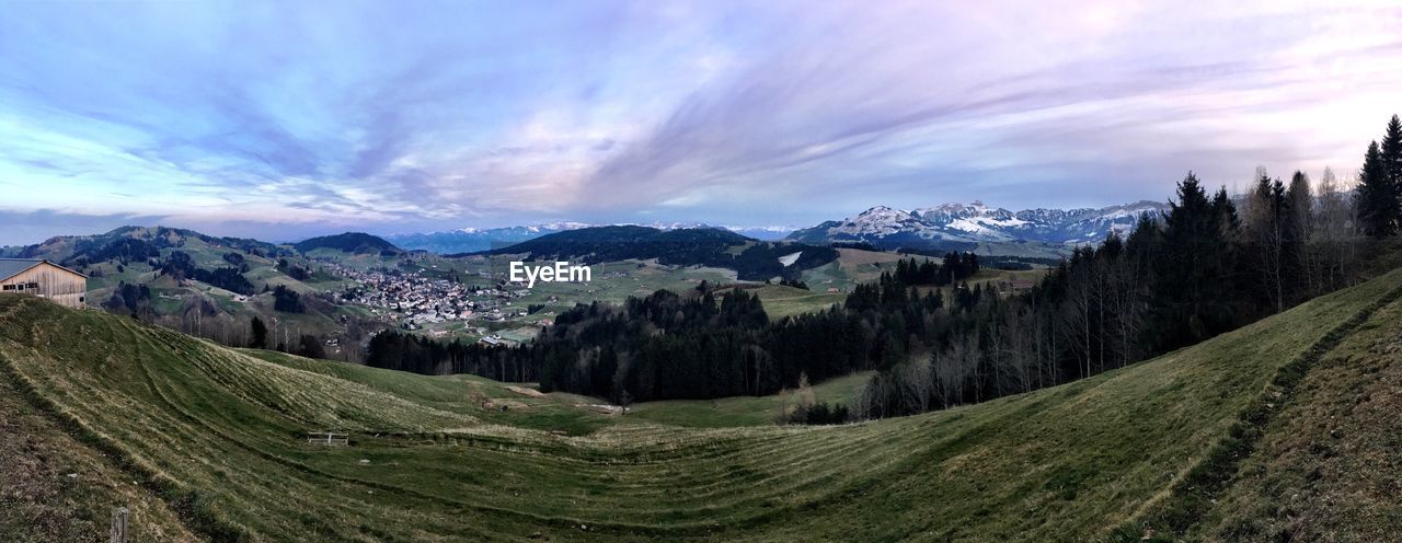 Panoramic view of landscape and mountains against sky