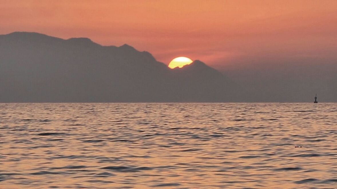 SUNSET OVER SEA