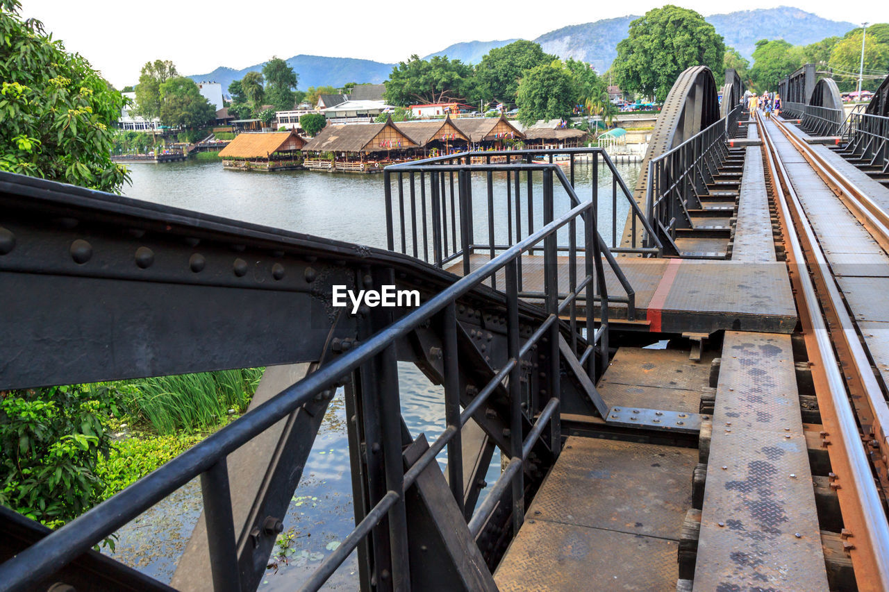 High angle view of bridge over the river kwai over railroad tracks