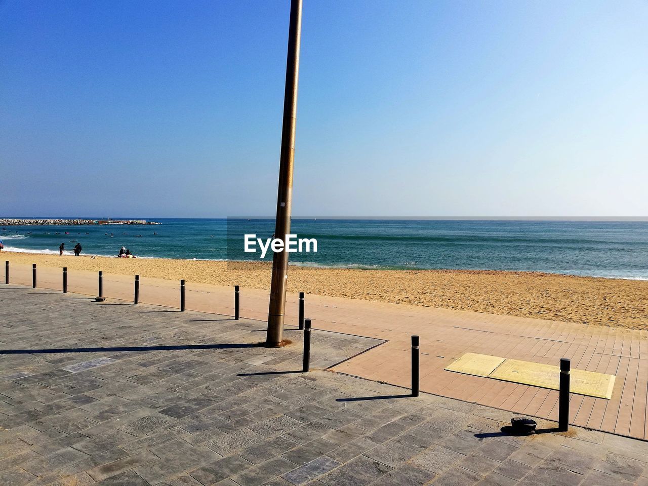 SCENIC VIEW OF BEACH AGAINST CLEAR SKY