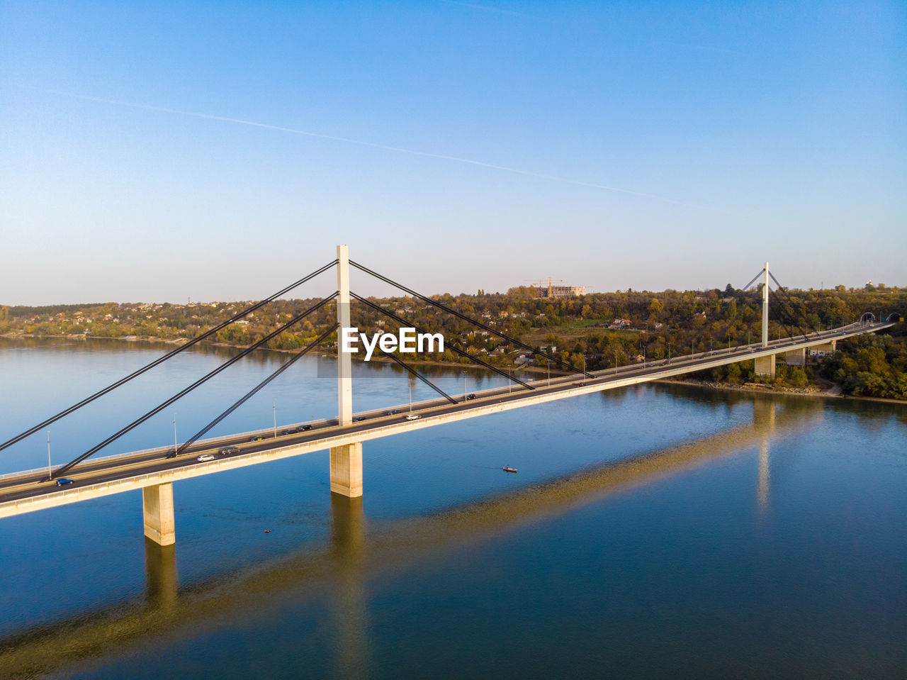 GOLDEN GATE BRIDGE OVER RIVER AGAINST SKY