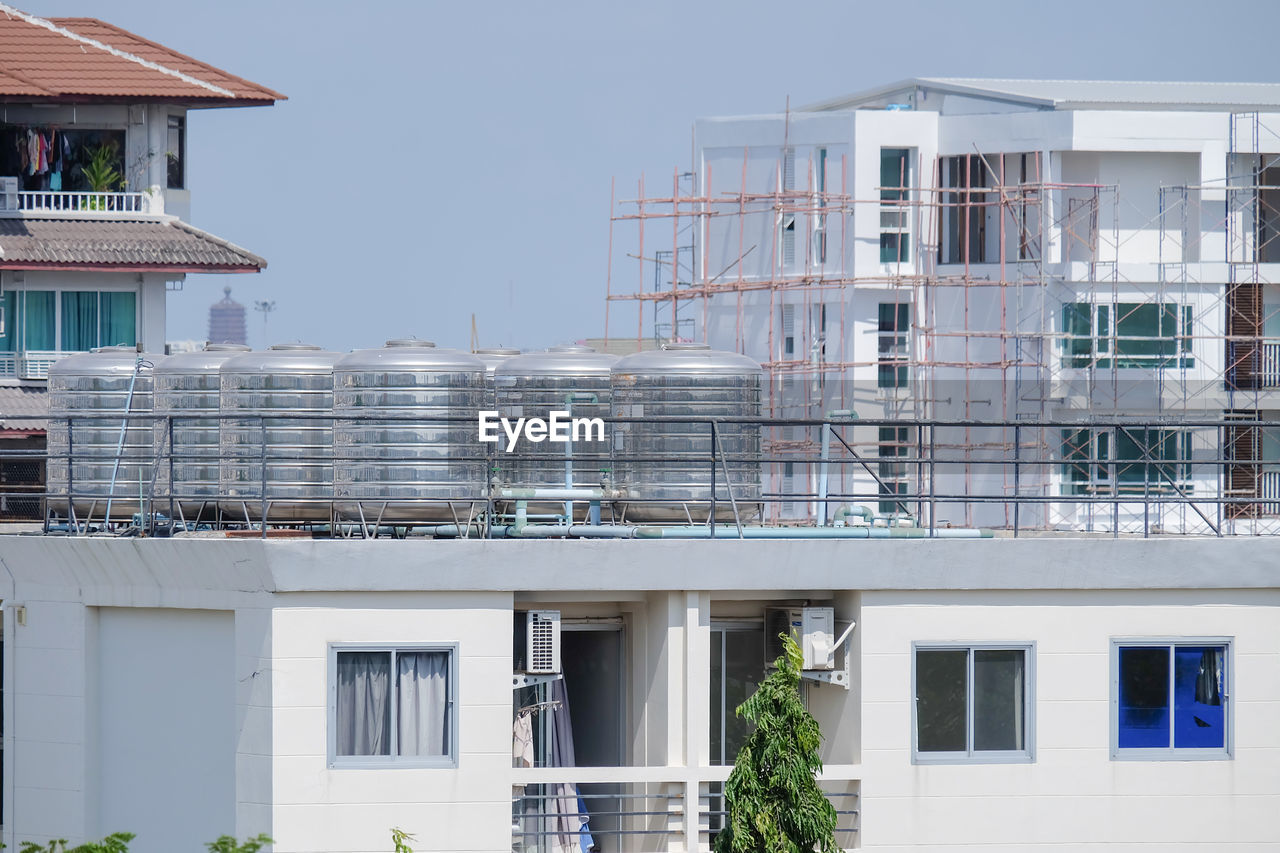 Low angle view of buildings against clear sky
