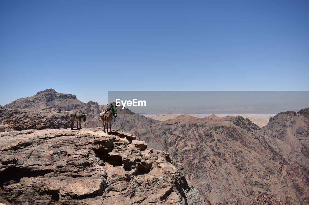 Scenic view of mountains against clear sky