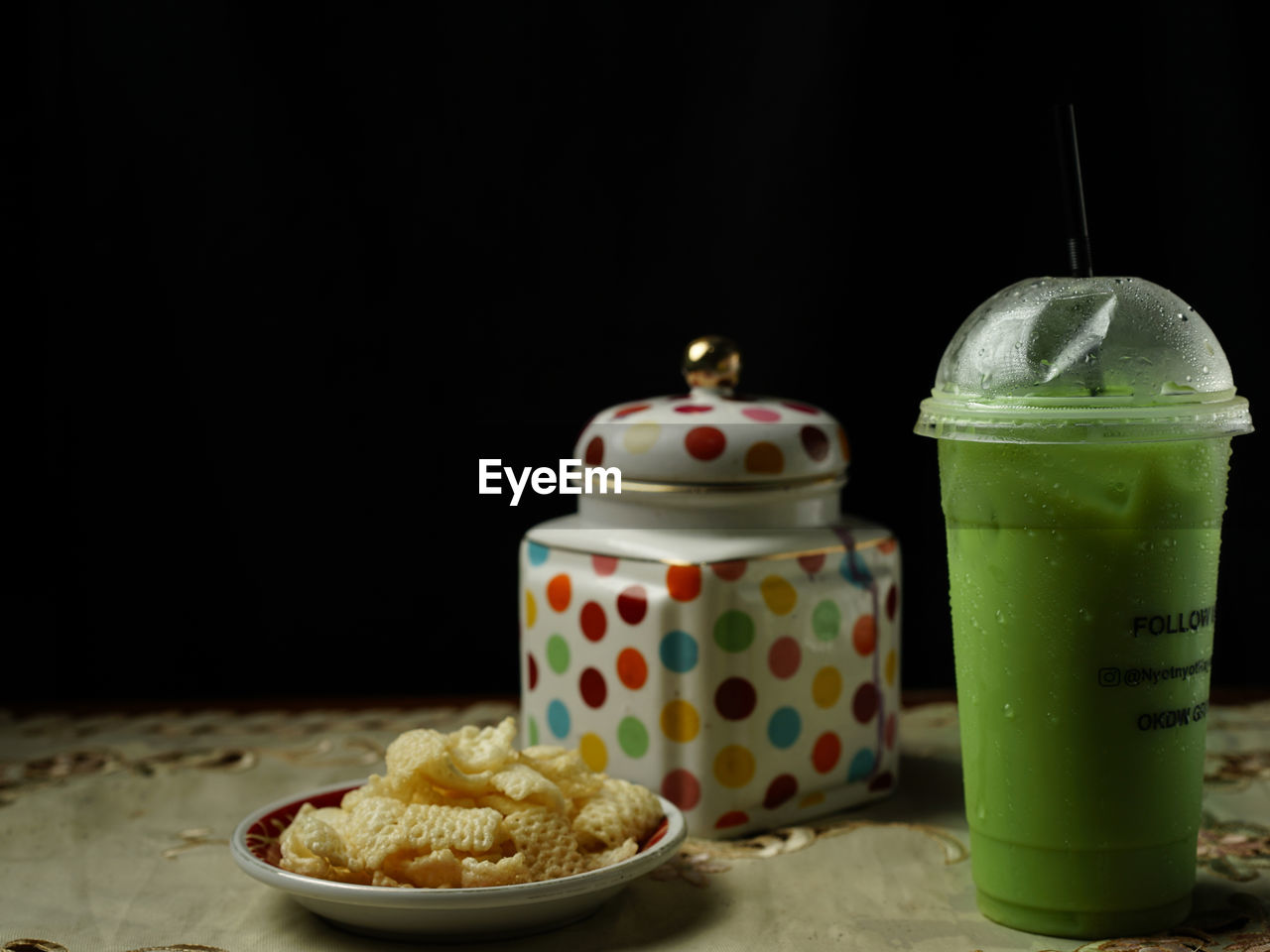 CLOSE-UP OF DESSERT WITH DRINK ON TABLE