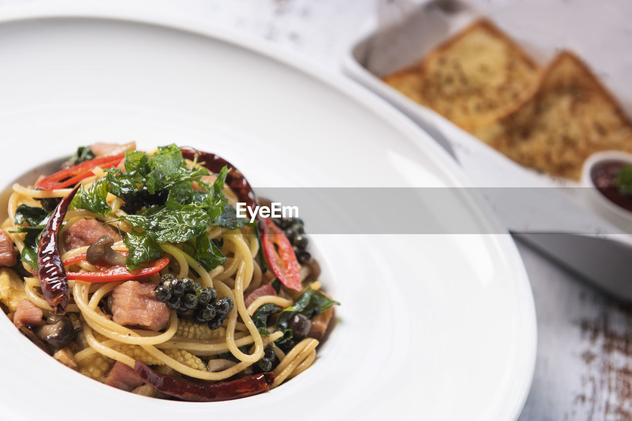 Thai style stir-fried spicy spaghetti