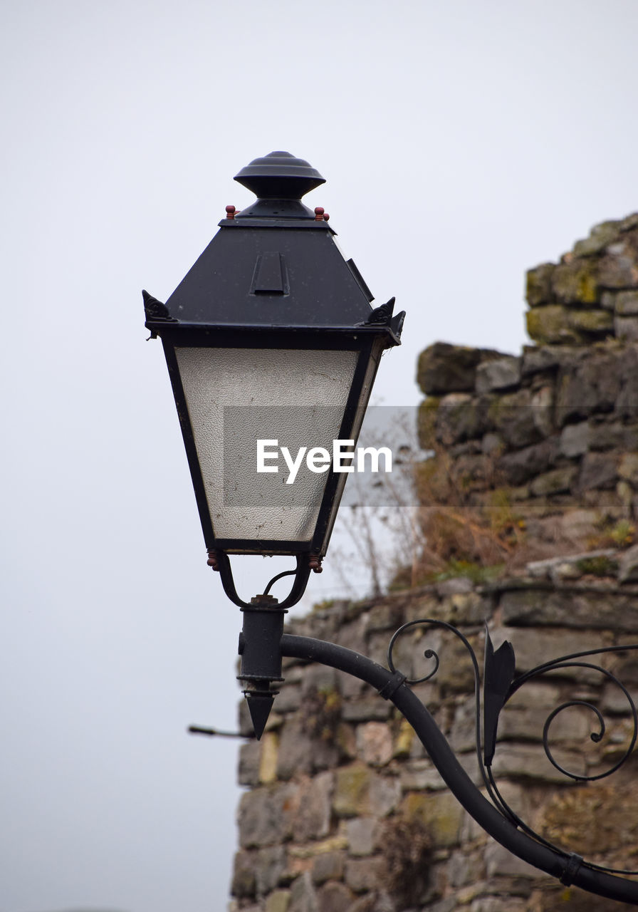 Low angle view of street light against clear sky