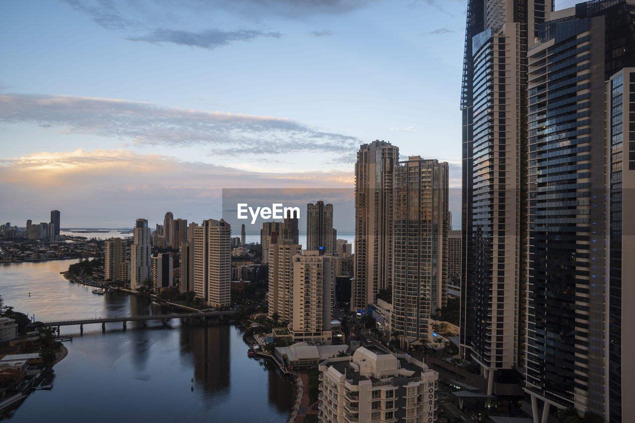 Modern buildings in city against sky