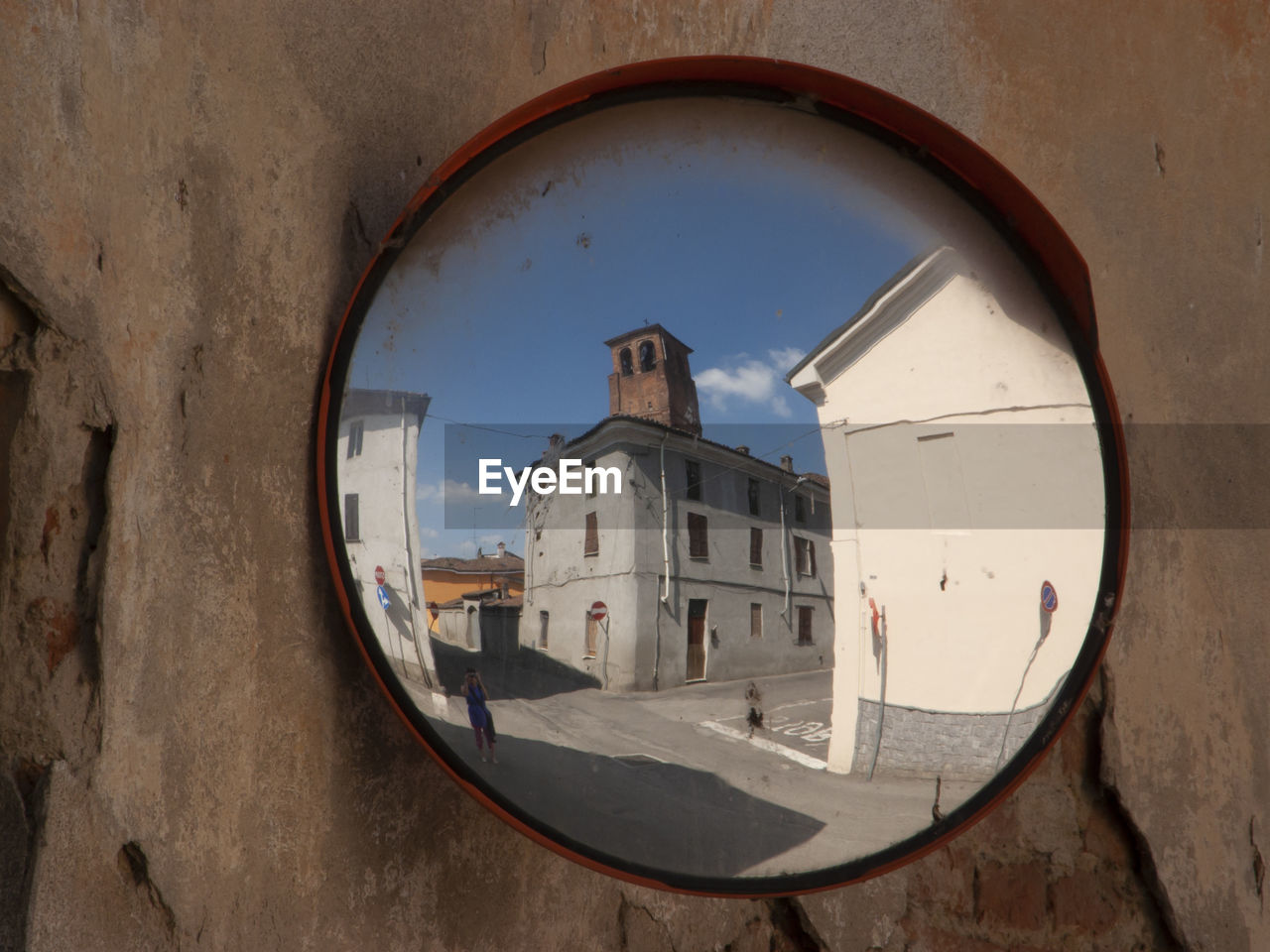 View of the road junction through the road mirror