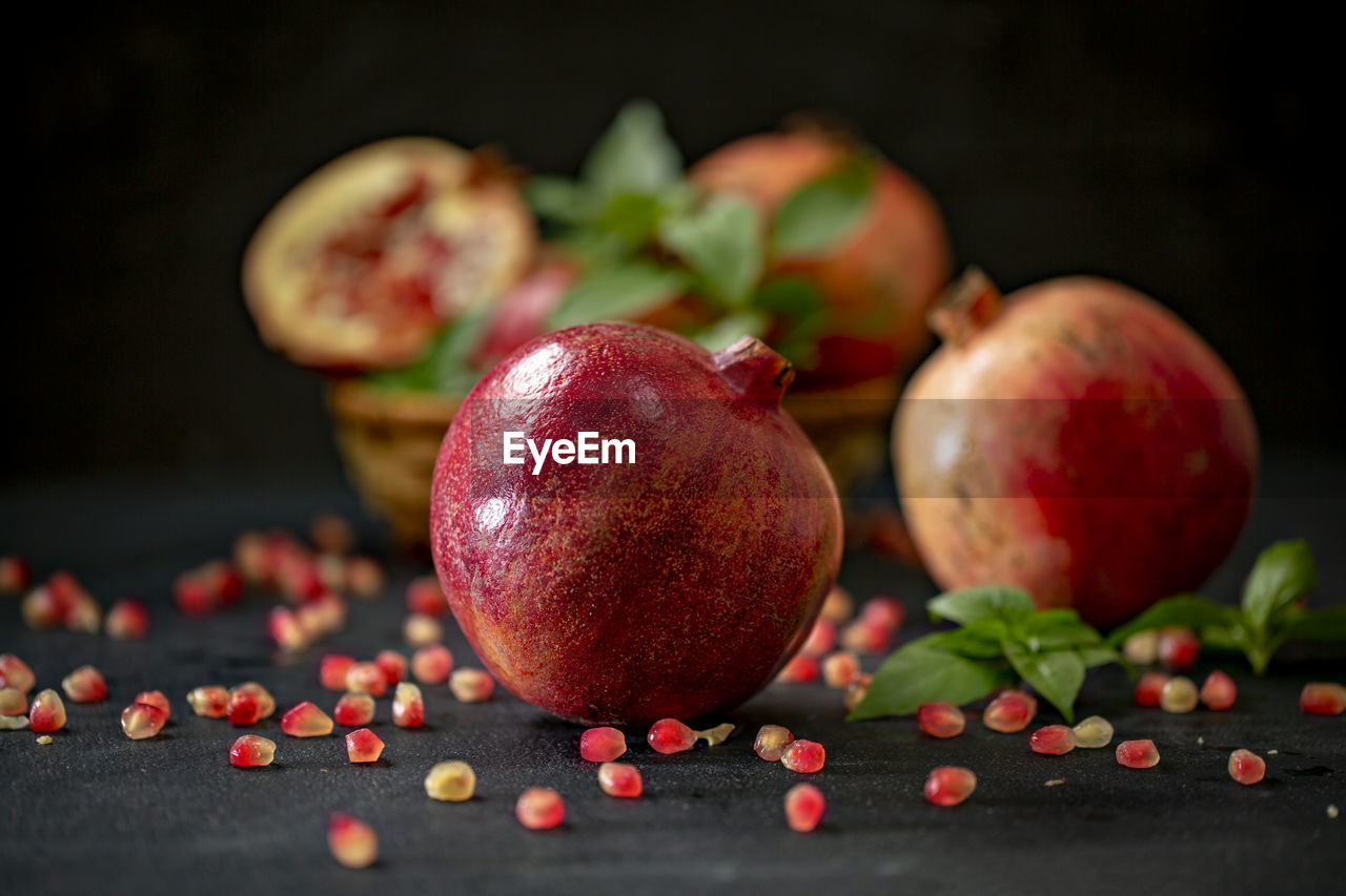 CLOSE-UP OF APPLE ON TABLE