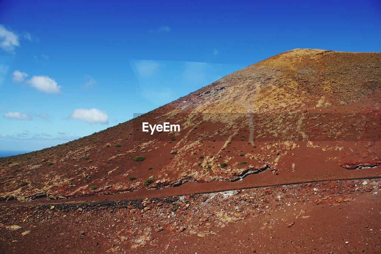 Scenic view of mountain against sky