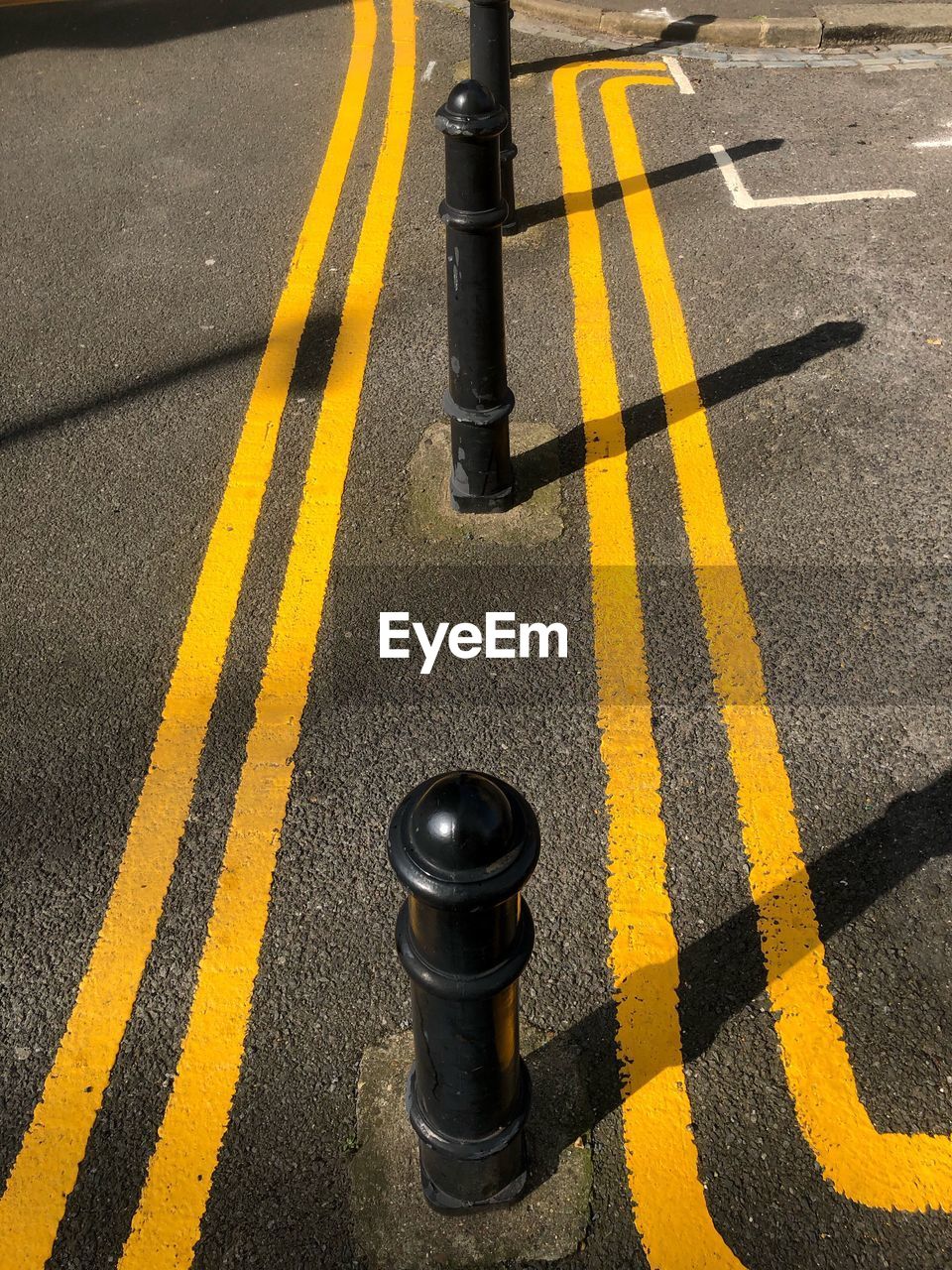 High angle view of poles on street