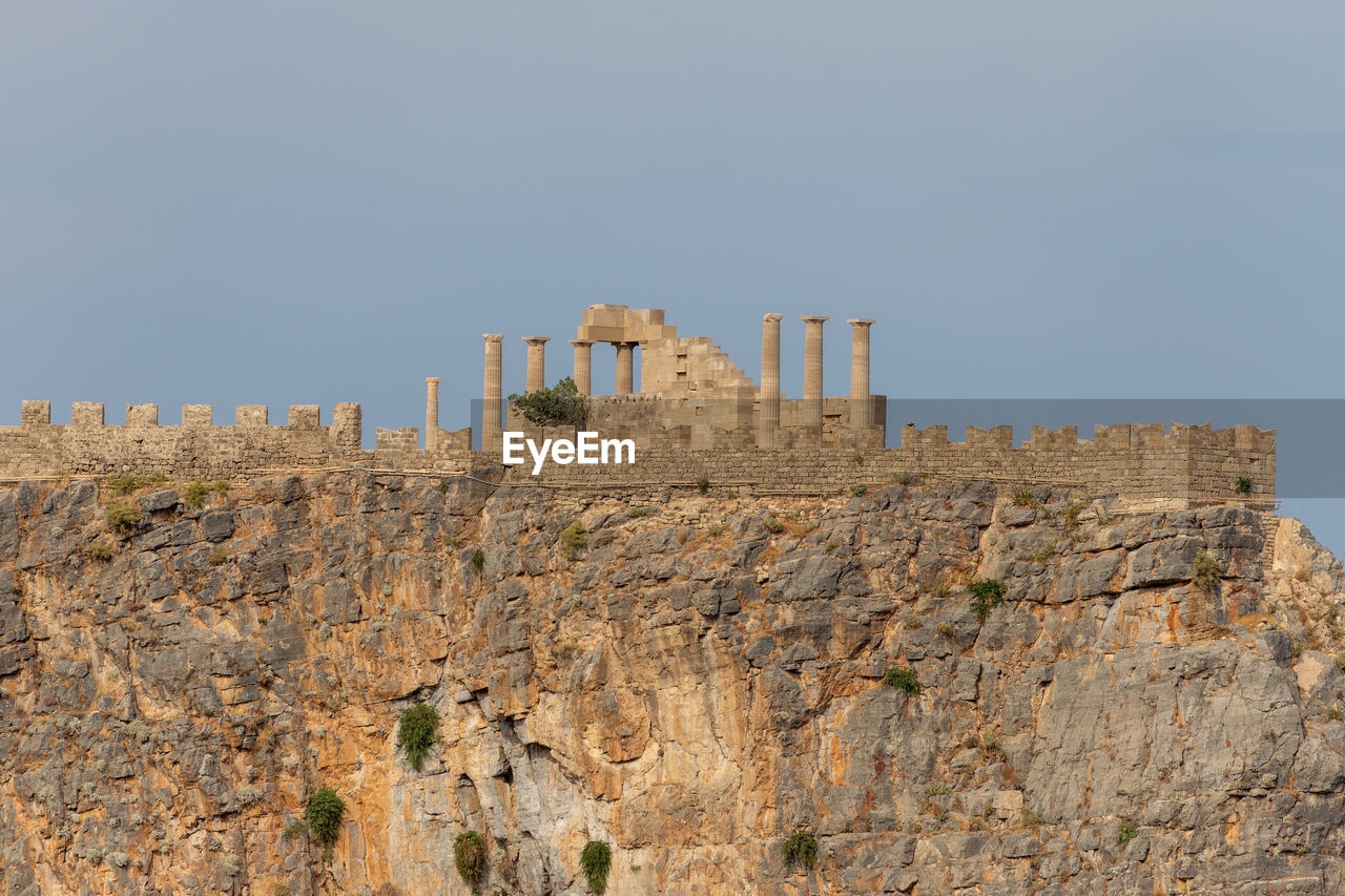 Close-up of the antique acropolis of lindos on greek island rhodes on a sunny day in spring