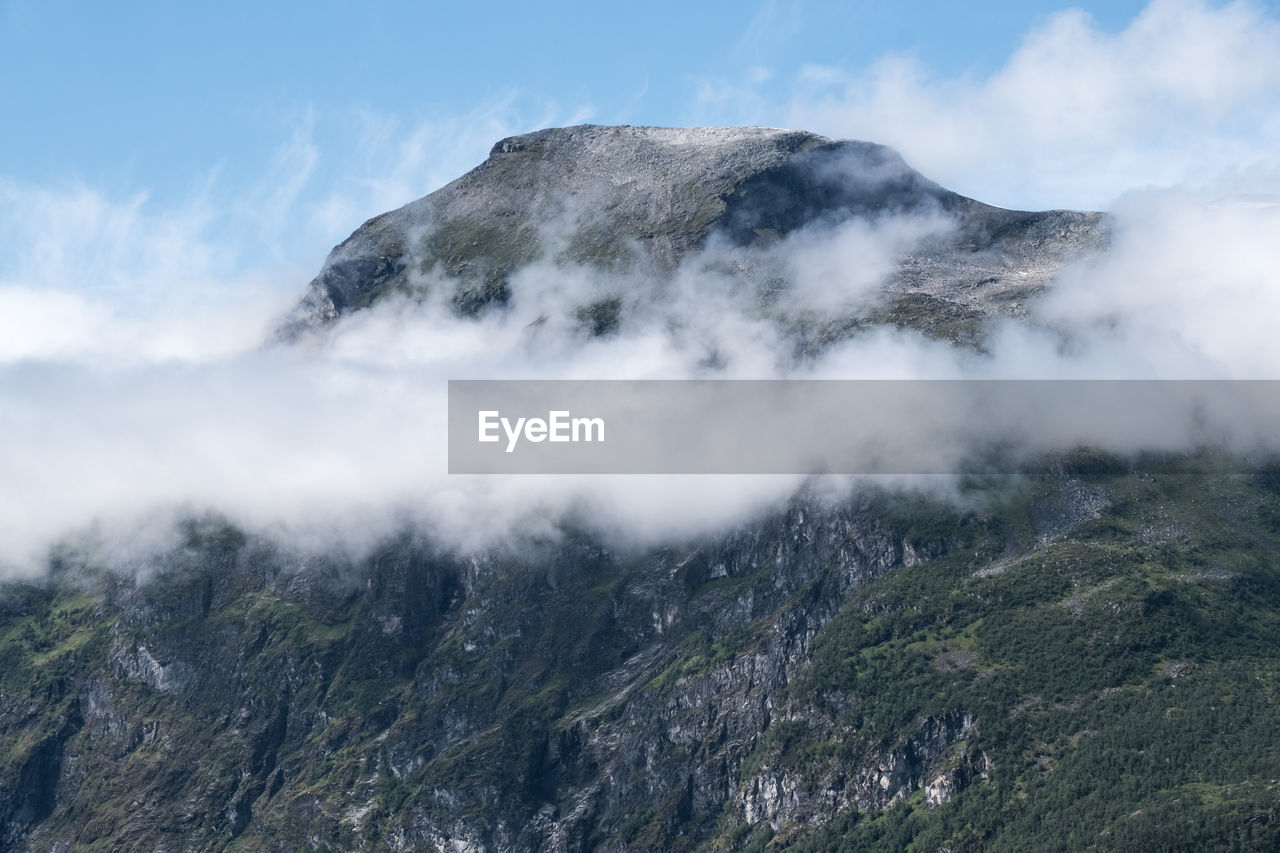 Scenic view of majestic mountains against sky