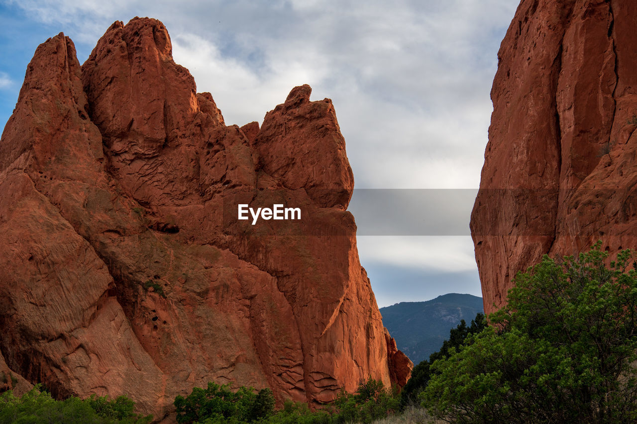 rock, rock formation, scenics - nature, environment, landscape, nature, sky, travel destinations, beauty in nature, land, valley, arch, travel, cloud, non-urban scene, canyon, national park, mountain, no people, geology, wilderness, plant, wadi, desert, terrain, semi-arid, outdoors, tourism, tranquility, formation, sandstone, cliff, red, park, natural environment, tranquil scene, eroded, tree, climate, plateau, physical geography, idyllic