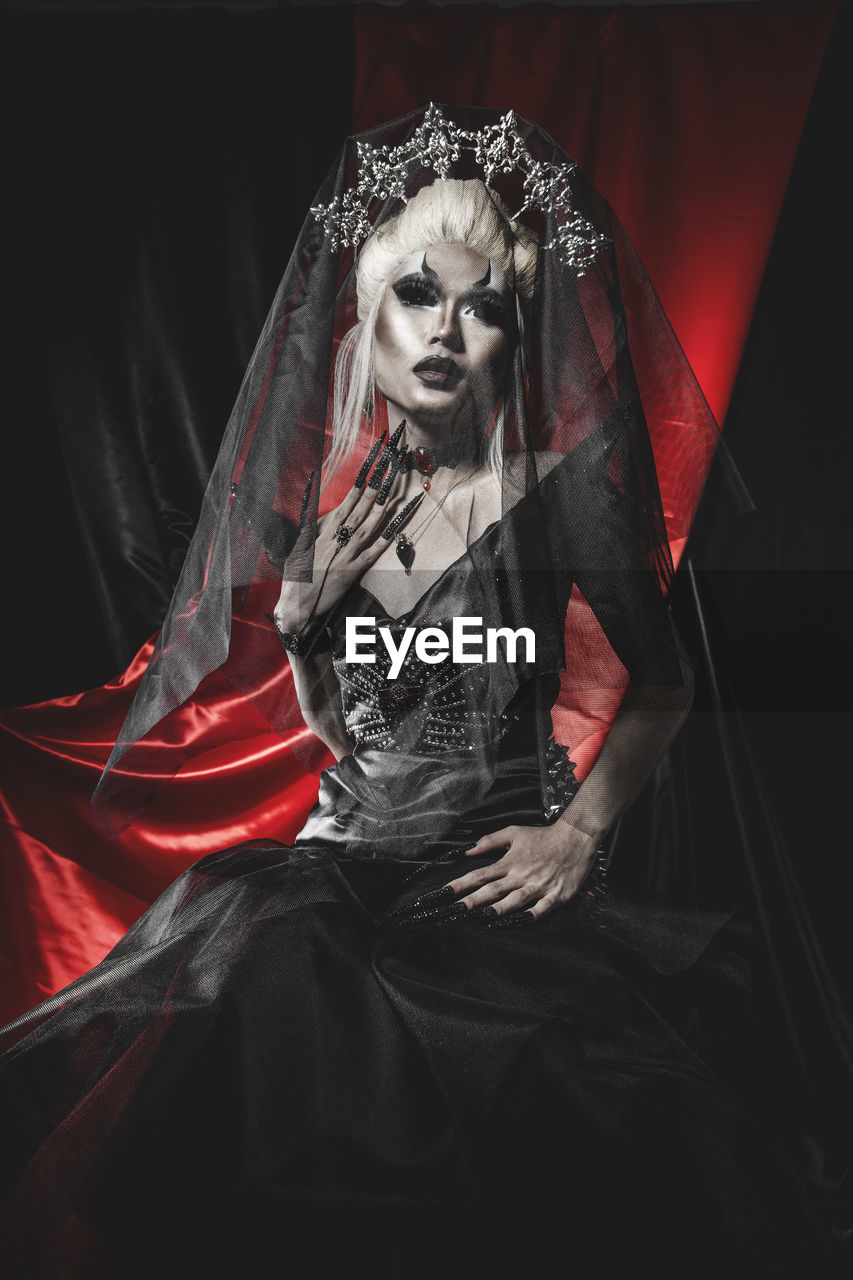 adult, one person, women, spooky, celebration, fear, horror, make-up, costume, clothing, indoors, mystery, red, darkness, portrait, halloween, female, black, dress, evil, black background, studio shot, dark, death, looking at camera, arts culture and entertainment, gothic style, wedding dress