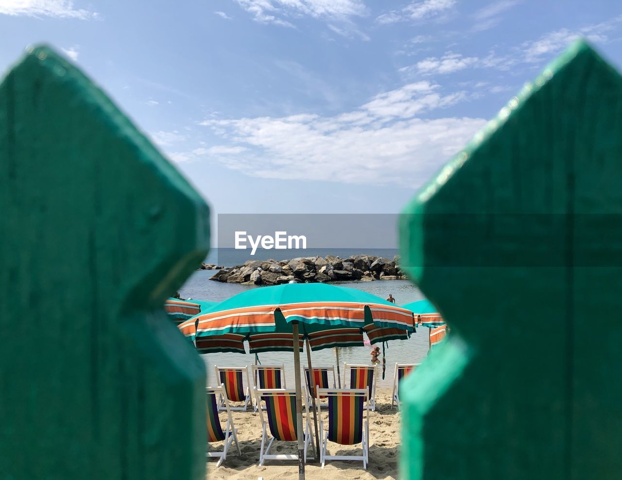 Building by sea against sky